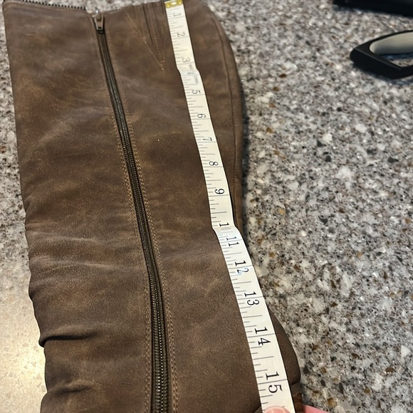 Not yet Rated- high heel boot is with zipper details. - Picture 9 of 11